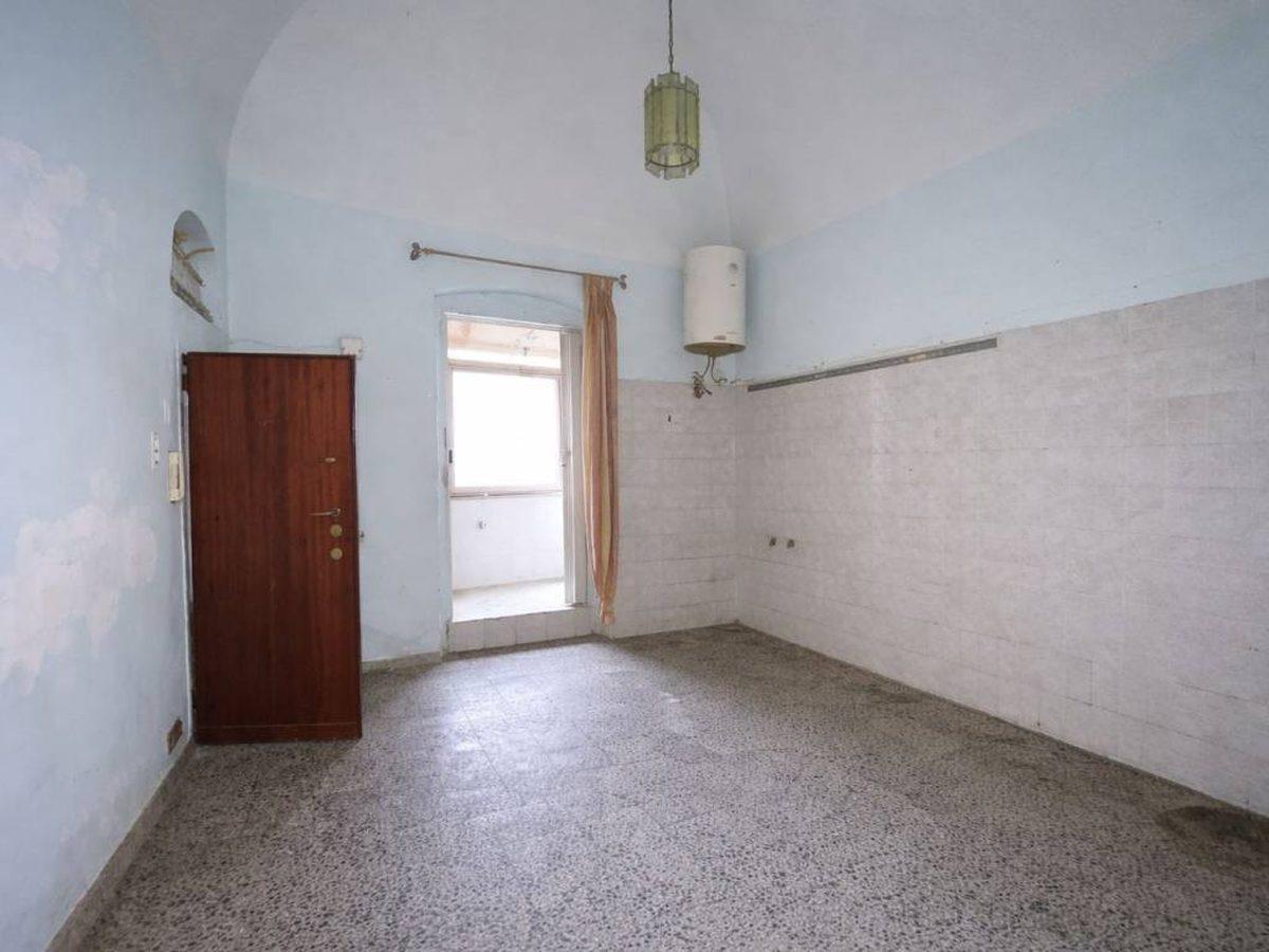 Empty vaulted apartment before virtual staging